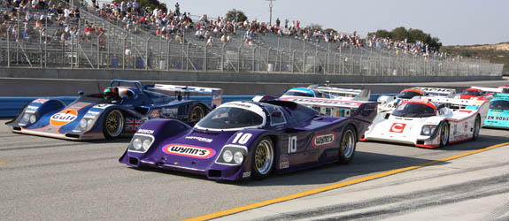 2009 Monterey Historics 651a The purple beast lines up alongside the Kremer K8 as the grid prepares to roll. (© GrandTouringPrototype.com)